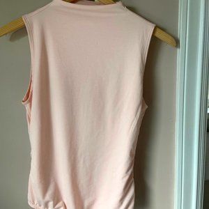 Light pink body suit